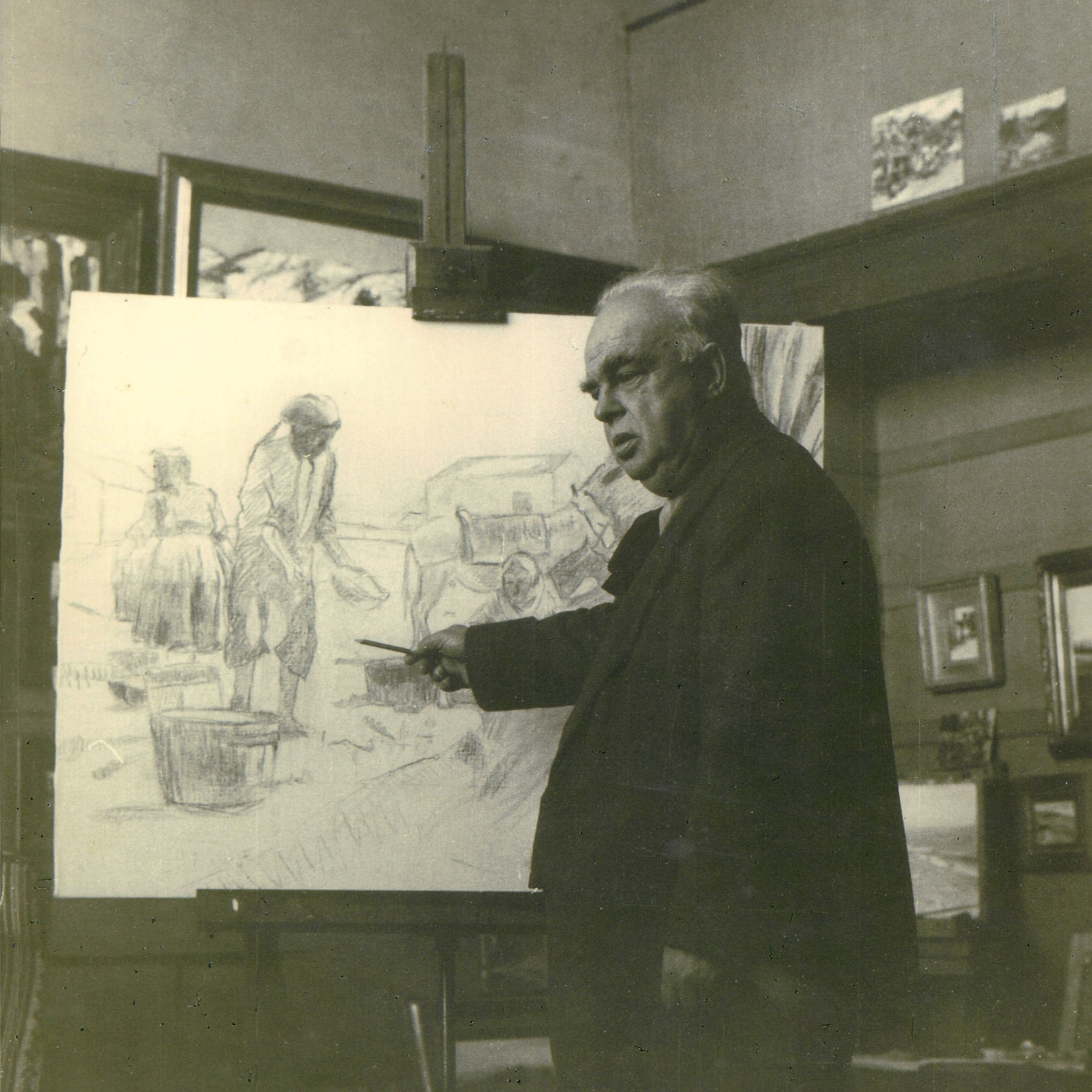 An archival photograph of the artist inside his atelier, showing his workspace. An archival photograph of the artist inside his atelier, showing his workspace.